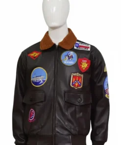 High-quality Top Gun Maverick leather jacket on a mannequin, featuring iconic military patches and a brown fur collar for an authentic pilot look.