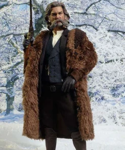Actor Kurt Russell in Hateful Eight wearing the iconic John Ruth brown fur coat in a snowy winter movie setting.