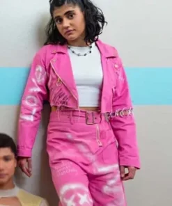 Full look of Heartbreak High Amerie Wadia Pink Jacket and matching pink amerie wadia outfits pants. Distressed biker style, white crop top.
