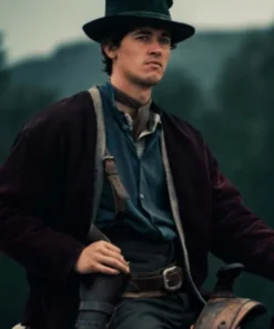 Actor Tom Blyth wearing the Billy the Kid Tom Blyth Jacket while riding a horse, showcasing the authentic Western outlaw style of William H. Bonney.