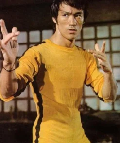 Side view of the Bruce Lee Yellow Tracksuit showing the black leg stripes from America Jackets.