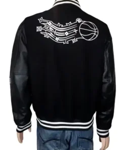 Back view of the black Louis Vuitton x NBA Bomber Jacket showing a white graphic of a basketball mid-flight with stylized LV Monogram elements trailing it. This Louis Vuitton Sports Jacket features black leather sleeves and a knit waistband.