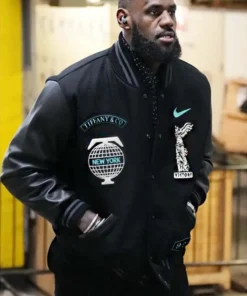 LeBron James wearing the black varsity Tiffany and Co jacket. The front features a 