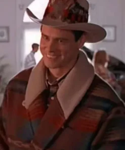 Jim Carrey smiling in Dumb and Dumber cowboy costume inspired by Lloyd Christmas bar scene outfit.