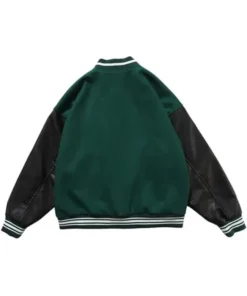 Back of a green and black varsity jacket, showing the plain green torso and black leather sleeves.