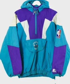 Close-up image of a Charlotte Hornets Starter jacket pullover. This vintage Charlotte Hornets Starter jacket highlights the teal, purple, and white color-block design, the front pouch with the embroidered logo, and the NBA and Starter jackets Hornets logos.