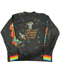 Great British Bake Off Noel alien sweater rear view showing astronaut and 