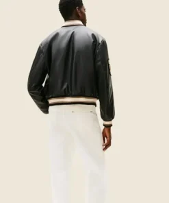 Back-Side-Of-The-APXGP-Damson-Idris-Black-Leather-Varsity-Jacket-on-a-Male-Model