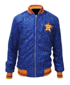 Full-front view of a shimmering blue houston astros women's jacket (bomber style) on a mannequin. It features a zipper closure, the orange and white Astros star logo on the chest, and red and yellow striped trim on the collar, waist, and cuffs.