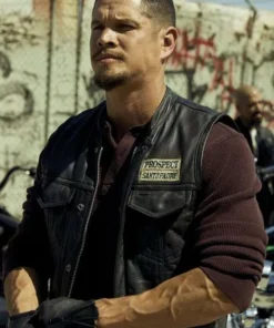 EZ wearing the original Mayans M.C Ezekiel Reyes Vest with Santo Padre PROSPECT patch in an outdoor scene