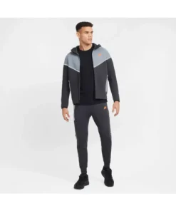 Front view of grey Nike Tech full reflective tracksuit for men featuring reflective panels and zip-up jacket.