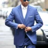 Denzel Washington wearing the Highest 2 Lowest blue suit, styled with a white shirt and tie, showcasing a sharp celebrity-inspired formal look.