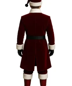 Red velvet Santa Claus coat for men (back view) featuring a knee-length overcoat style, white Vegan -fur trim on the collar and cuffs, and a black belt. The wearer is also sporting a Santa hat, black gloves, and red boots.