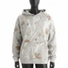 Front view of an Abercrombie off white camo hoodie. Features a cream-toned camouflage pattern with autumn maple leaves and a front pouch pocket.