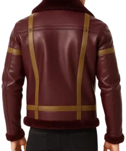 Back view of men’s maroon shearling leather jacket featuring brown detailing and soft fur lining, perfect for winter 2025 trends.