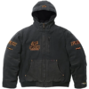 Dark grey Supreme Fox Racing Denim Hooded Work Jacket front side with orange embroidered logos and ribbed cuffs.