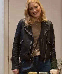 My Secret Santa Alexandra Breckenridge Taylor Black Biker Leather Jacket, featuring a classic women's moto style with a zippered front and lapel collar, as worn by the Taylor character in the movie.