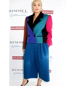 Rita Ora showcasing the Marc Jacobs x Zendaya Vanity Fair color block zoot suit in a chic, vibrant look.