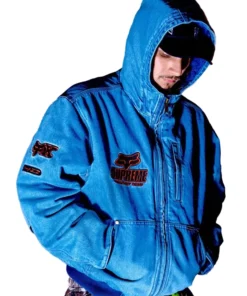 Front view of Supreme Fox Racing Denim Hooded Work Jacket in blue featuring Fox Factory Team embroidery and front zipper design.