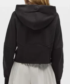 Back view of the black NFL x Carolina Panthers lululemon women's oversized scuba half zip hoodie.