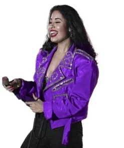Mannequin display of the famous Selena purple rhinestone jacket, a belted bustier jacket biker style.