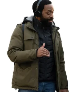 Robert "Skeet" Douglas in his Rob Peace 2024 Skeet Douglas outerwear; a stylish brown jacket layered over a vest.