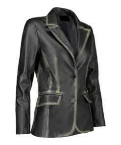 Angled view of distressed black leather blazer highlighting tailored waist shape, lapels, and pocket flaps