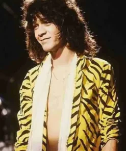 Legendary guitarist Eddie Van Halen smiling on stage