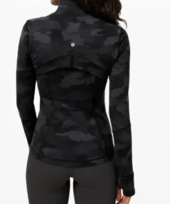 Rear view of a camo lululemon jacket showing the reflective logo, back ventilation flap, and slimming seams of the lulu define jacket camo.