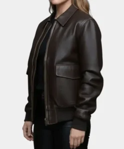 Side view of the Millie The Housemaid black bomber leather jacket, highlighting the sleek profile and high-quality leather construction.