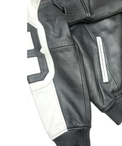 A stylish 8 Ball Black White Jacket featuring a deep black leather base and contrasting white graphics.