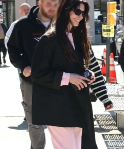 Anne Hathaway Verity Blazer showcasing a polished textile finish and a high-end profile for a sophisticated, modern fashion statement.