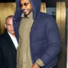 NYC Carmelo Anthony Puffer Hooded jacket in a side-profile view.