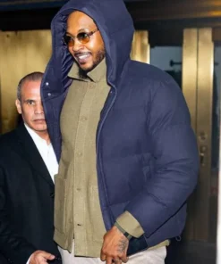 NYC Carmelo Anthony Puffer Hooded jacket in a side-profile view.