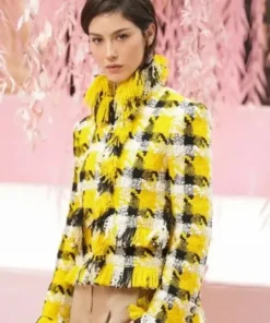 A detailed view of the Gracie Abrams Spring 2026 couture yellow jacket from America Jackets.