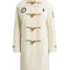 High-quality Polo Ralph Lauren Olympic opening ceremony coat in cream with toggle buttons and patches, perfect as a Team USA ceremony outerwear 2026.