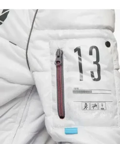 Close-up of the silver zipper on the white Portal puffer jacket from America Jackets.