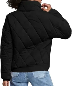 Rear view of a model wearing the dolman quilted knit jacket Black, highlighting the relaxed fit, dropped shoulders, and stylish oversized silhouette.