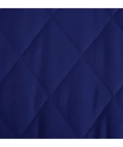 Close-up of the diamond pattern stitching on a Womens Navy Dolman Quilted Jacket, showing the high-quality quilted fabric and navy blue texture.