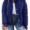 A stylish Womens Navy Dolman Quilted Jacket styled with jeans, highlighting the front button closure, side pockets, and relaxed dolman sleeve fit.