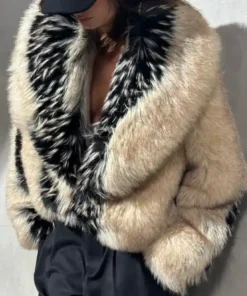 Front view of Erin Andrews viral fur coat 2026 with oversized plush body and black-smoke gradient finish