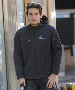 John Mayer wearing the Summit Ice jacket outdoors. This ice summit jacket is a high-quality softshell popular for its unique brand history.